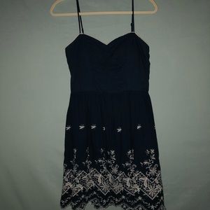 Spaghetti strap Navy blue dress. Cutsie detail